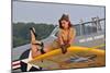 1940's Style Pin-Up Girl Lying on a T-6 Texan Training Aircraft-null-Mounted Photographic Print