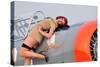 1940's Style Pin-Up Girl Posing on a T-6 Texan Training Aircraft-null-Stretched Canvas