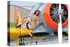 1940's Style Pin-Up Girl Posing on a T-6 Texan Training Aircraft-null-Stretched Canvas