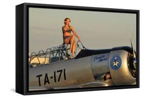 1940's Style Pin-Up Girl Sitting on the Cockpit of a World War II T-6 Texan-null-Framed Stretched Canvas