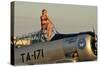 1940's Style Pin-Up Girl Sitting on the Cockpit of a World War II T-6 Texan-null-Stretched Canvas