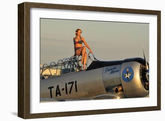 1940's Style Pin-Up Girl Sitting on the Cockpit of a World War II T-6 Texan-null-Framed Photographic Print