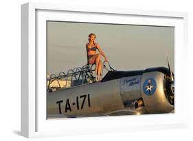 1940's Style Pin-Up Girl Sitting on the Cockpit of a World War II T-6 Texan-null-Framed Photographic Print