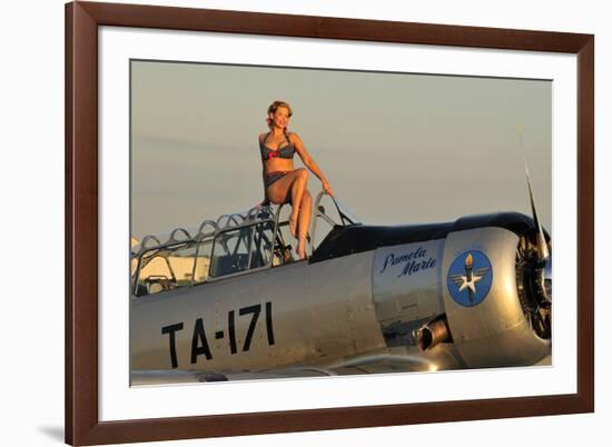 1940's Style Pin-Up Girl Sitting on the Cockpit of a World War II T-6 Texan-null-Framed Photographic Print