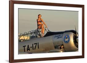 1940's Style Pin-Up Girl Sitting on the Cockpit of a World War II T-6 Texan-null-Framed Photographic Print