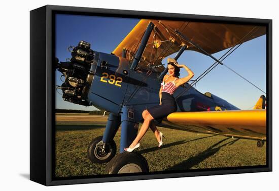 1940's Style Pin-Up Girl Sitting on the Wing of a Stearman Biplane-null-Framed Stretched Canvas