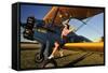 1940's Style Pin-Up Girl Sitting on the Wing of a Stearman Biplane-null-Framed Stretched Canvas