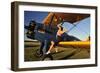 1940's Style Pin-Up Girl Sitting on the Wing of a Stearman Biplane-null-Framed Premium Photographic Print