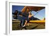 1940's Style Pin-Up Girl Sitting on the Wing of a Stearman Biplane-null-Framed Premium Photographic Print