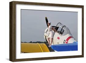 1940's Style Pin-Up Girl Sitting on the Wing of a Vintage T-6 Texan Aircraft-null-Framed Photographic Print