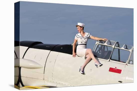 1940's Style Pin-Up Girl Sitting Outside the Cockpot of a T-6 Texan-null-Stretched Canvas