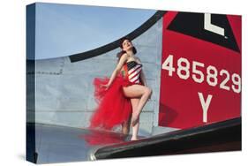 1940's Style Pin-Up Girl Standing on the Tail of a B-17 Bomber-null-Stretched Canvas