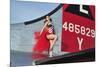 1940's Style Pin-Up Girl Standing on the Tail of a B-17 Bomber-null-Mounted Photographic Print