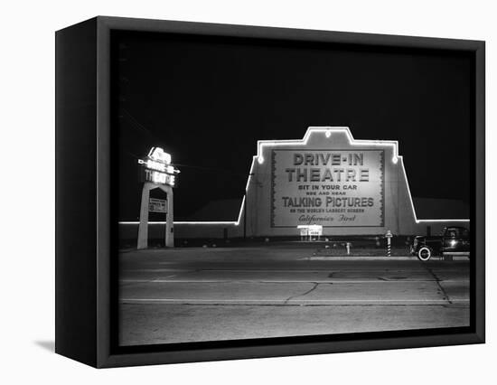 1940s MARQUEE SIGN FOR DRIVE-IN MOVIE THEATER LIT UP AT NIGHT-Panoramic Images-Framed Stretched Canvas