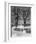 1940s PILE OF SNOW-COVERED FIREWOOD LOGS STACKED BETWEEN TWO TREES WITH COUNTRY CHURCH IN BACKGR...-Panoramic Images-Framed Photographic Print