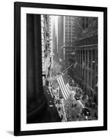 1945 Aerial View of VE Day Celebration on Wall Street NYC with Flags and Confetti Flying-null-Framed Photographic Print