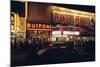 1945: Embassy Theater Showing Newsreel Format Films at Night, Times Square, New York, NY-Andreas Feininger-Mounted Photographic Print