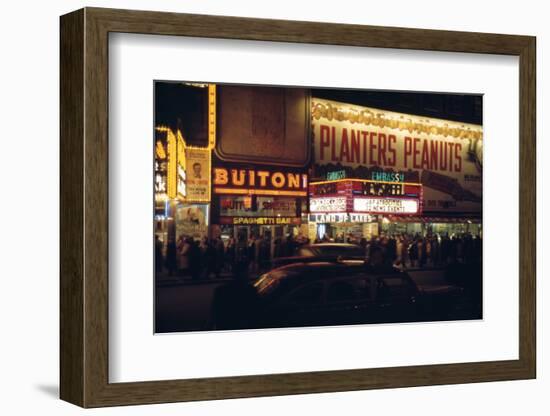 1945: Embassy Theater Showing Newsreel Format Films at Night, Times Square, New York, NY-Andreas Feininger-Framed Photographic Print