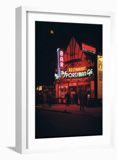 1945: Neon Lights Outside the Sportsman Cafe on 236 West 50th Street at Night, New York, NY-Andreas Feininger-Framed Photographic Print