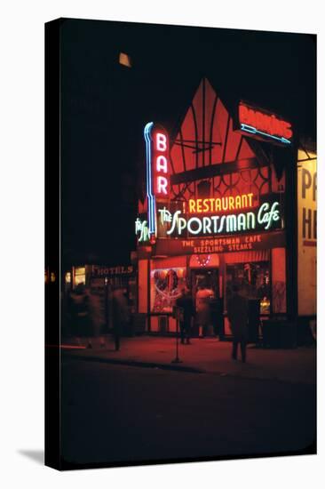 1945: Neon Lights Outside the Sportsman Cafe on 236 West 50th Street at Night, New York, NY-Andreas Feininger-Stretched Canvas