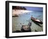 1946: Sam Cunningham Sells Sea Shells to Tourist Along the Seashore in Montego Bay, Jamaica-Eliot Elisofon-Framed Photographic Print