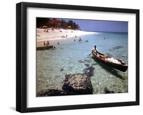 1946: Sam Cunningham Sells Sea Shells to Tourist Along the Seashore in Montego Bay, Jamaica-Eliot Elisofon-Framed Photographic Print