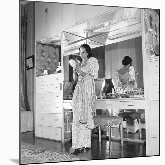 1949: Consuelo Madrigal Putting Make Up on for a Party-Jack Birns-Mounted Premium Photographic Print