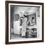 1949: Consuelo Madrigal Putting Make Up on for a Party-Jack Birns-Framed Photographic Print