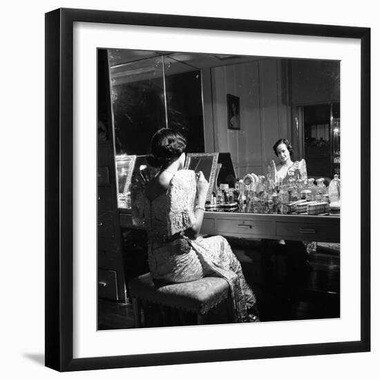 1949: Consuelo Madrigal Putting Make Up on for a Party-Jack Birns-Framed Photographic Print