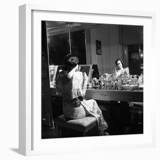 1949: Consuelo Madrigal Putting Make Up on for a Party-Jack Birns-Framed Photographic Print