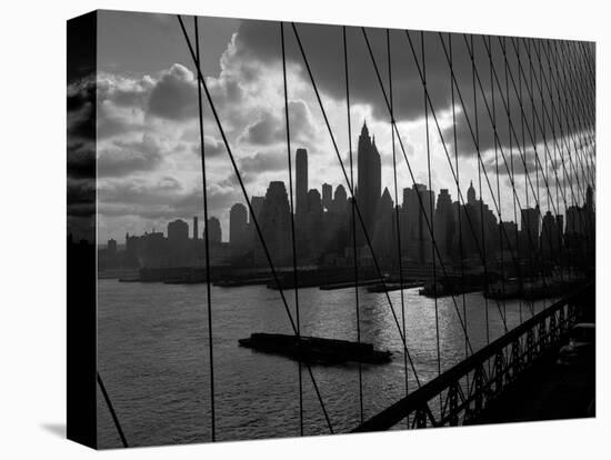 1950s-1960s Downtown Manhattan Skyline from Brooklyn Bridge Barge in East River NYC-null-Stretched Canvas