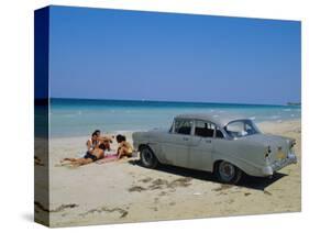 1950s American Car on the Beach, Goanabo, Cuba, Caribbean Sea, Central America-Bruno Morandi-Stretched Canvas