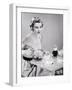 1950s HOSTESS WOMAN HOUSEWIFE SERVING POURING TEA COFFEE SEATED AT TABLE-Panoramic Images-Framed Photographic Print