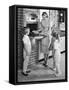 1950s MOTHER AND THREE DAUGHTERS STANDING AROUND OVEN IN KITCHEN BAKING PIE-Panoramic Images-Framed Stretched Canvas
