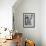 1950s MOTHER AND THREE DAUGHTERS STANDING AROUND OVEN IN KITCHEN BAKING PIE-Panoramic Images-Framed Photographic Print displayed on a wall