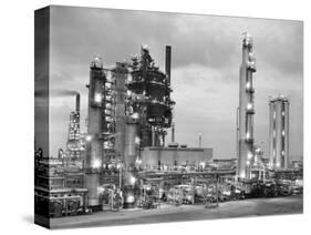 1950s NIGHT SHOT OF OIL REFINERY LIGHTS ON PETROCHEMICAL INDUSTRY GASOLINE FOSSIL FUEL TIDEWATER...-Panoramic Images-Stretched Canvas