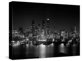 1950s Night Skyline Empire State Building Above Hudson River Midtown Manhattan, New York City-null-Stretched Canvas