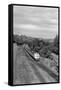 1950s Overhead View of Streamlined Front Cab Diesel Locomotive Passenger Railroad Train Passing-null-Framed Stretched Canvas