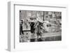 1950s PEDESTRIANS WOMAN HOLDING BOX OVER HEAD CAUGHT IN SUDDEN RAIN STORM 12TH & MARKET STREETS...-H. Armstrong Roberts-Framed Photographic Print