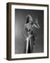 1950s WOMAN WEARING METALLIC EVENING GOWN HOLDING UP WINE GLASS PROFILE-Panoramic Images-Framed Photographic Print