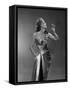 1950s WOMAN WEARING METALLIC EVENING GOWN HOLDING UP WINE GLASS PROFILE-Panoramic Images-Framed Stretched Canvas