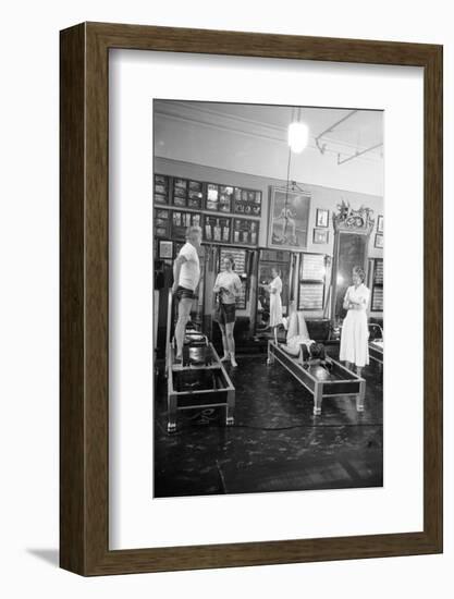 1951: Roberta Peters Working Out with Joseph Pilates and Others in a Studio, New York, NY-Michael Rougier-Framed Photographic Print