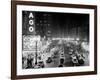 1953 Night Scene of Chicago, State Street with Traffic and Movie Marquee with Pedestrians-null-Framed Photographic Print