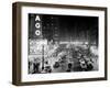 1953 Night Scene of Chicago, State Street with Traffic and Movie Marquee with Pedestrians-null-Framed Premium Photographic Print