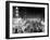 1953 Night Scene of Chicago, State Street with Traffic and Movie Marquee with Pedestrians-null-Framed Premium Photographic Print