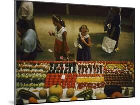 1955: Fairgoers as They Look at a Display of Produce at the Iowa State Fair, Des Moines, Iowa-John Dominis-Mounted Photographic Print