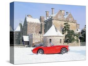 1956 Austin Healey 100M In Snow In Front Of Palace House, Beaulieu-null-Stretched Canvas