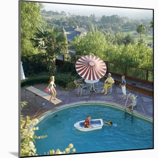 1959: a Family at their Backyard Swimming Pool-Frank Scherschel-Mounted Photographic Print