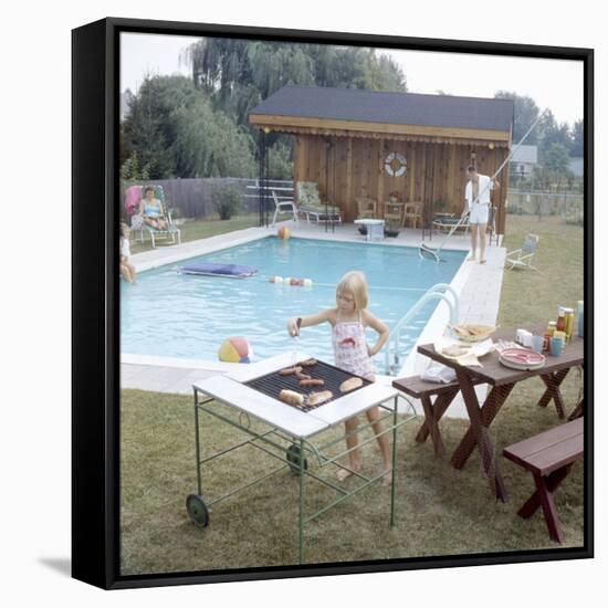 1959: Family Cookout and Enjoying the Backyard Swimming Pool, Trenton, New Jersey-Frank Scherschel-Framed Stretched Canvas