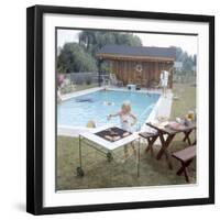 1959: Family Cookout and Enjoying the Backyard Swimming Pool, Trenton, New Jersey-Frank Scherschel-Framed Premium Photographic Print